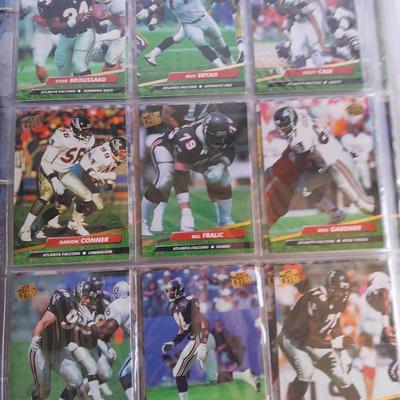 3 ring binder of Football cards, over 20 pages Rules of the game book, and 1970's Football stars book