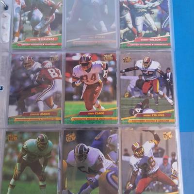 3 ring binder of Football cards, over 20 pages Rules of the game book, and 1970's Football stars book