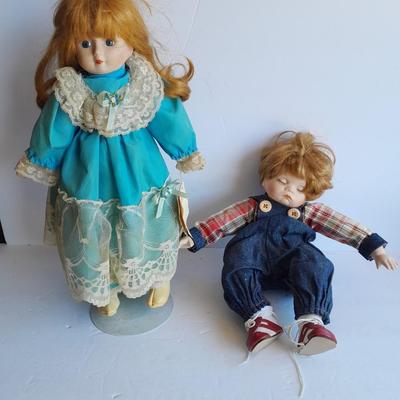 Two vintage porcelain dolls The Emerald Doll collection and a Heritage doll