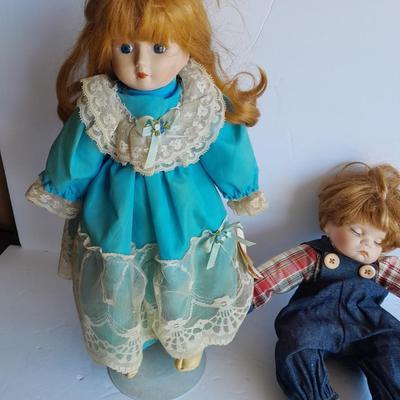 Two vintage porcelain dolls The Emerald Doll collection and a Heritage doll