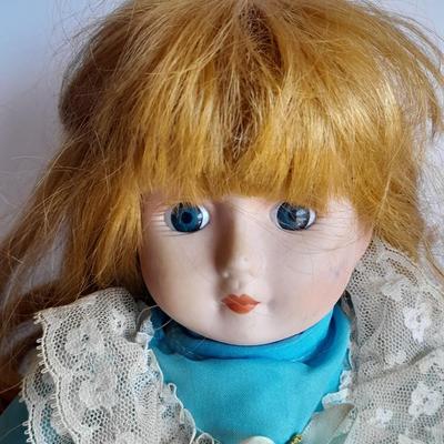 Two vintage porcelain dolls The Emerald Doll collection and a Heritage doll