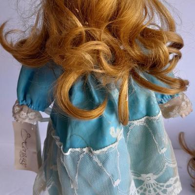 Two vintage porcelain dolls The Emerald Doll collection and a Heritage doll