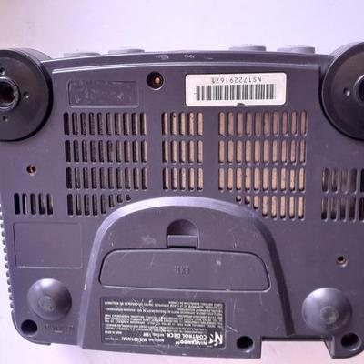 Nintendo 64 with controllers, Nine games, cords, and more