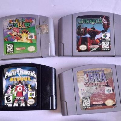 Nintendo 64 with controllers, Nine games, cords, and more