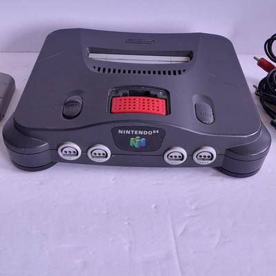 Nintendo 64 with controllers, Nine games, cords, and more
