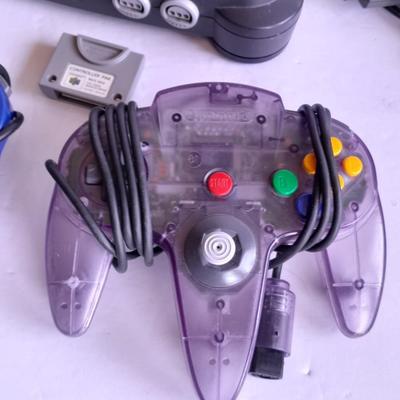 Nintendo 64 with controllers, Nine games, cords, and more