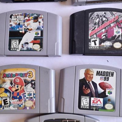 Nintendo 64 with controllers, Nine games, cords, and more