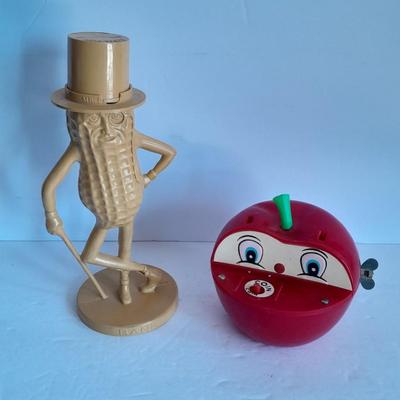 Advertisement Piggy banks Coin banks Mr. Peanut, Apple. Tootsie rolls, and Coke