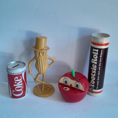 Advertisement Piggy banks Coin banks Mr. Peanut, Apple. Tootsie rolls, and Coke