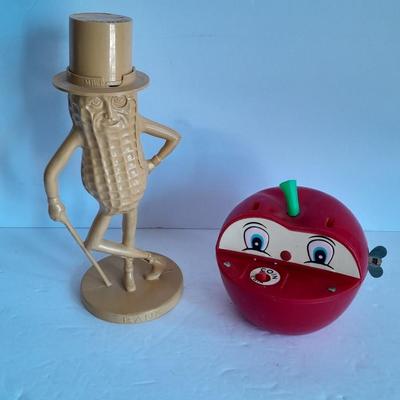 Advertisement Piggy banks Coin banks Mr. Peanut, Apple. Tootsie rolls, and Coke