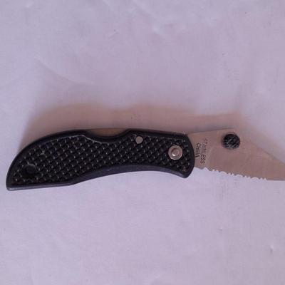 Two knives, double bladed and small black pocketknife