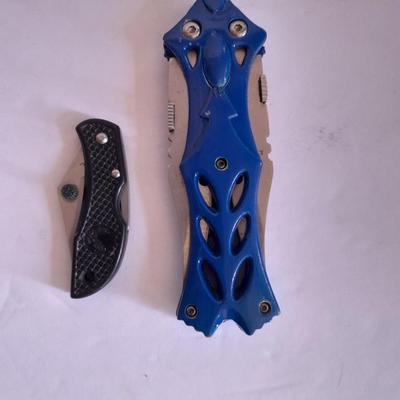 Two knives, double bladed and small black pocketknife