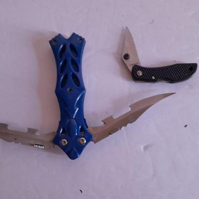Two knives, double bladed and small black pocketknife