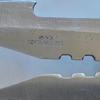 Two knives, double bladed and small black pocketknife