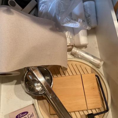Cheese Cutter, paper towels, bags, chip clips and fruit squeeze
