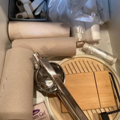 Cheese Cutter, paper towels, bags, chip clips and fruit squeeze