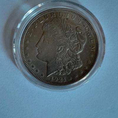 1921 Morgan Silver Dollar in blue felt case.