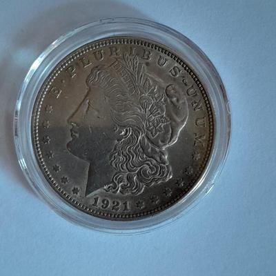 1921 Morgan Silver Dollar in blue felt case.