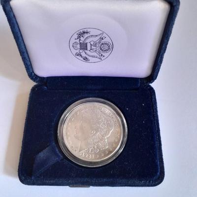 1921 Morgan Silver Dollar in blue felt case.