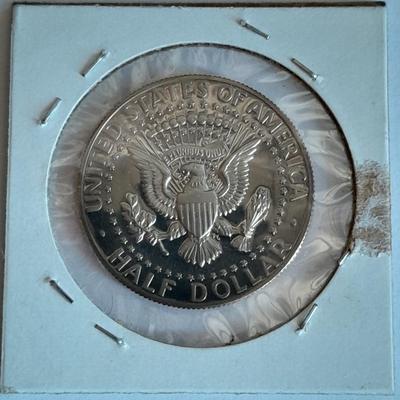 Six Kennedy Half Dollars 1964, 1983, 1984, 1985, 1986, and 1989