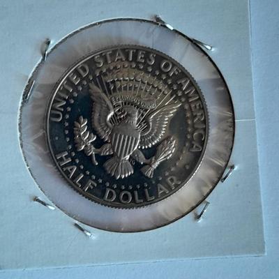 Six Kennedy Half Dollars 1964, 1983, 1984, 1985, 1986, and 1989