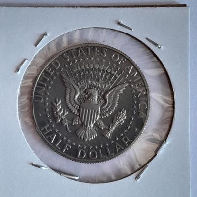 Six Kennedy Half Dollars 1964, 1983, 1984, 1985, 1986, and 1989