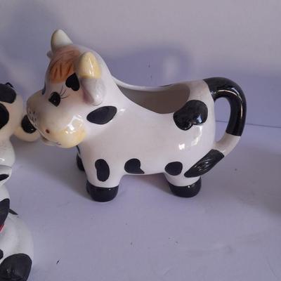 Holstien Cow Kitchen collectibles salt & pepper. creamer and Figures
