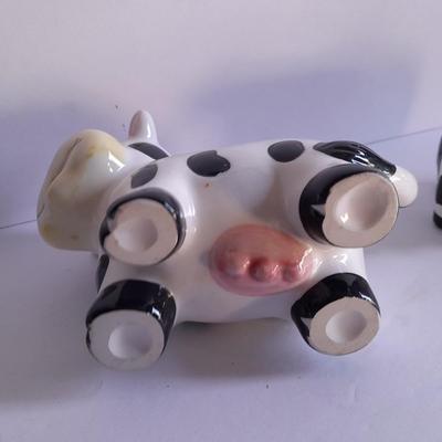 Holstien Cow Kitchen collectibles salt & pepper. creamer and Figures