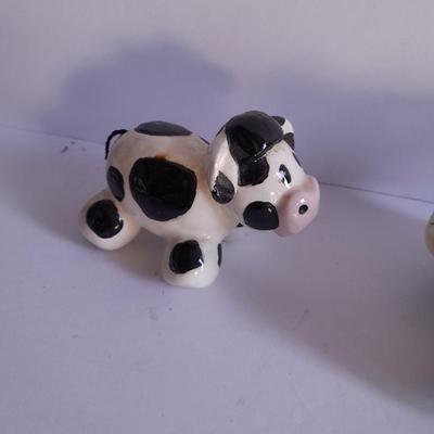 Holstien Cow Kitchen collectibles salt & pepper. creamer and Figures