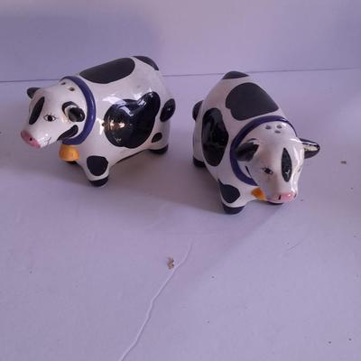 Holstien Cow Kitchen collectibles salt & pepper. creamer and Figures