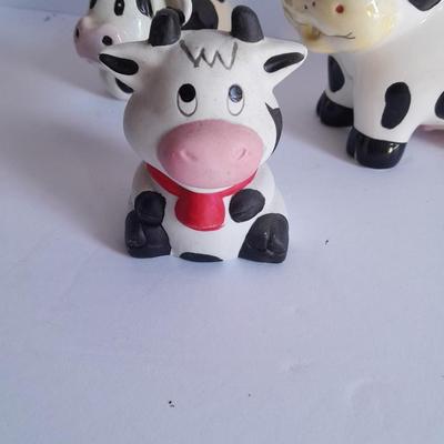 Holstien Cow Kitchen collectibles salt & pepper. creamer and Figures