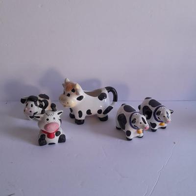 Holstien Cow Kitchen collectibles salt & pepper. creamer and Figures