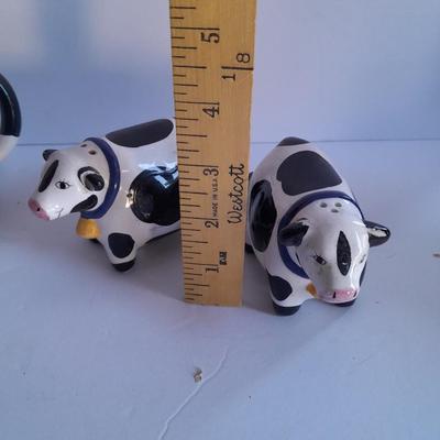 Holstien Cow Kitchen collectibles salt & pepper. creamer and Figures