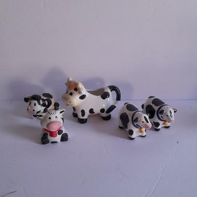 Holstien Cow Kitchen collectibles salt & pepper. creamer and Figures