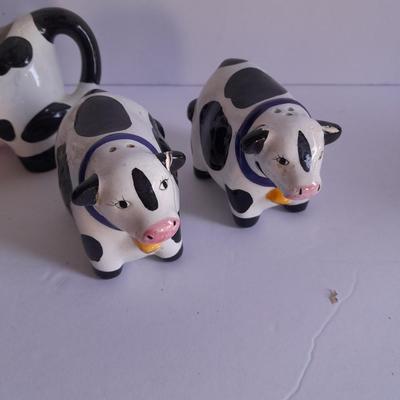 Holstien Cow Kitchen collectibles salt & pepper. creamer and Figures