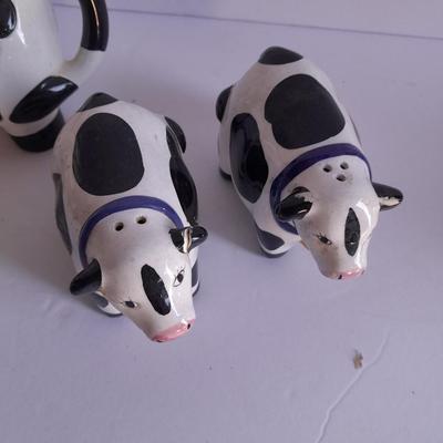 Holstien Cow Kitchen collectibles salt & pepper. creamer and Figures