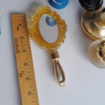Avon collectible bottles, Item's you would find on a vanity. Mirror, vase, flower and more