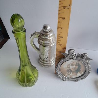 Avon collectible bottles, Item's you would find on a vanity. Mirror, vase, flower and more