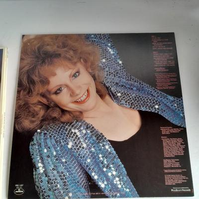 Three Reba McIntire 12" LP Vinyl Record Albums In great condition!