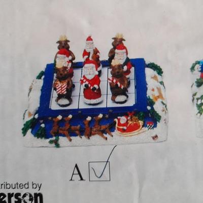 Collectibles Tic Tac Toe, illuminated church, cow ornament, otter snow globe and Hummingbird tea set