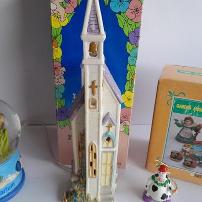 Collectibles Tic Tac Toe, illuminated church, cow ornament, otter snow globe and Hummingbird tea set