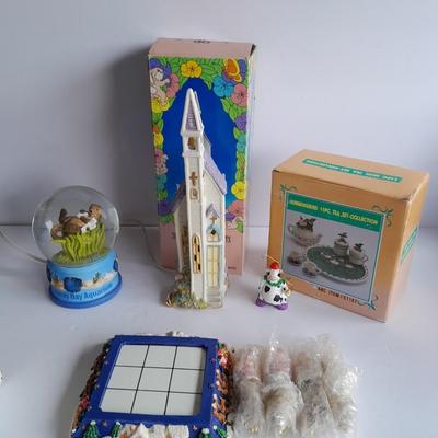 Collectibles Tic Tac Toe, illuminated church, cow ornament, otter snow globe and Hummingbird tea set