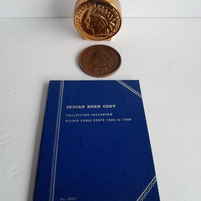 Indian head Penny Avon commemorative bottle, and large coin with Coin book and one Indian head penny