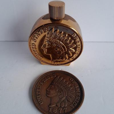 Indian head Penny Avon commemorative bottle, and large coin with Coin book and one Indian head penny