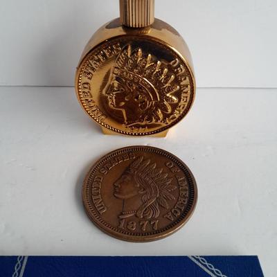Indian head Penny Avon commemorative bottle, and large coin with Coin book and one Indian head penny