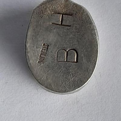 Sterling Silver .925 Men's ring, pendant .925 marked and small set gemstone .925 marked.