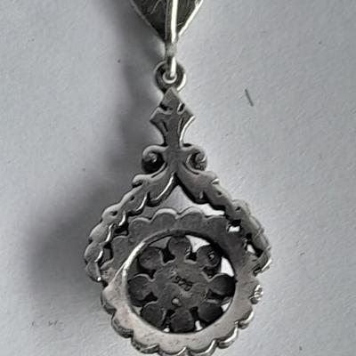 Sterling Silver .925 Men's ring, pendant .925 marked and small set gemstone .925 marked.
