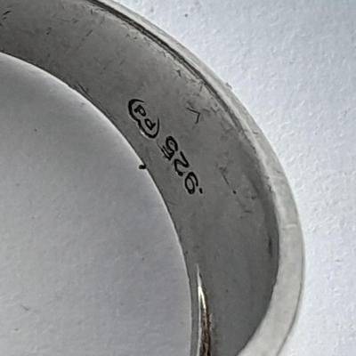 Sterling Silver .925 Men's ring, pendant .925 marked and small set gemstone .925 marked.