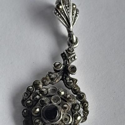 Sterling Silver .925 Men's ring, pendant .925 marked and small set gemstone .925 marked.