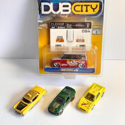 New in package DUB City Scion car and three toy cars Hot Wheels, Maisto Taxi